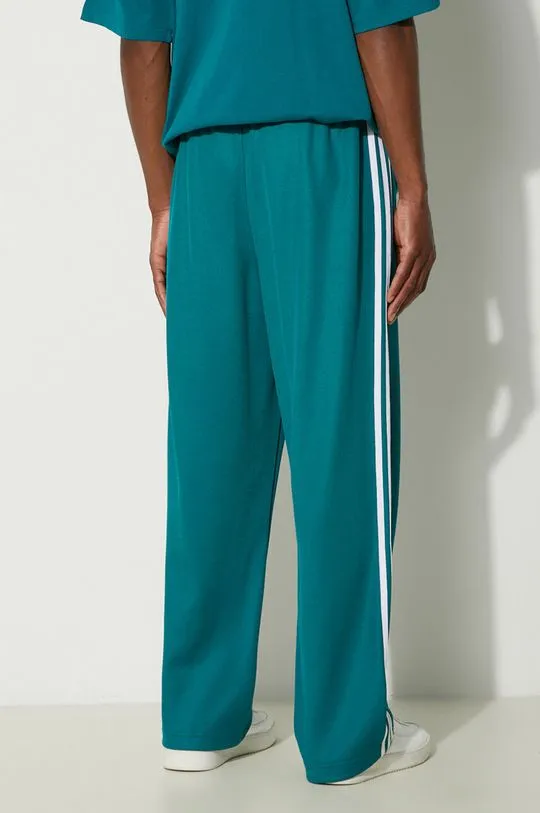 adidas Originals joggers Adicolor Baggy Fit Firebird Pant turquoise color IZ2473